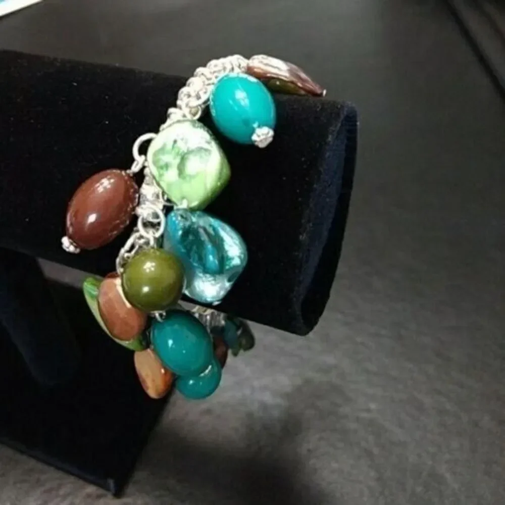 Bracelet with blue brown and green beads silver tone 7.5